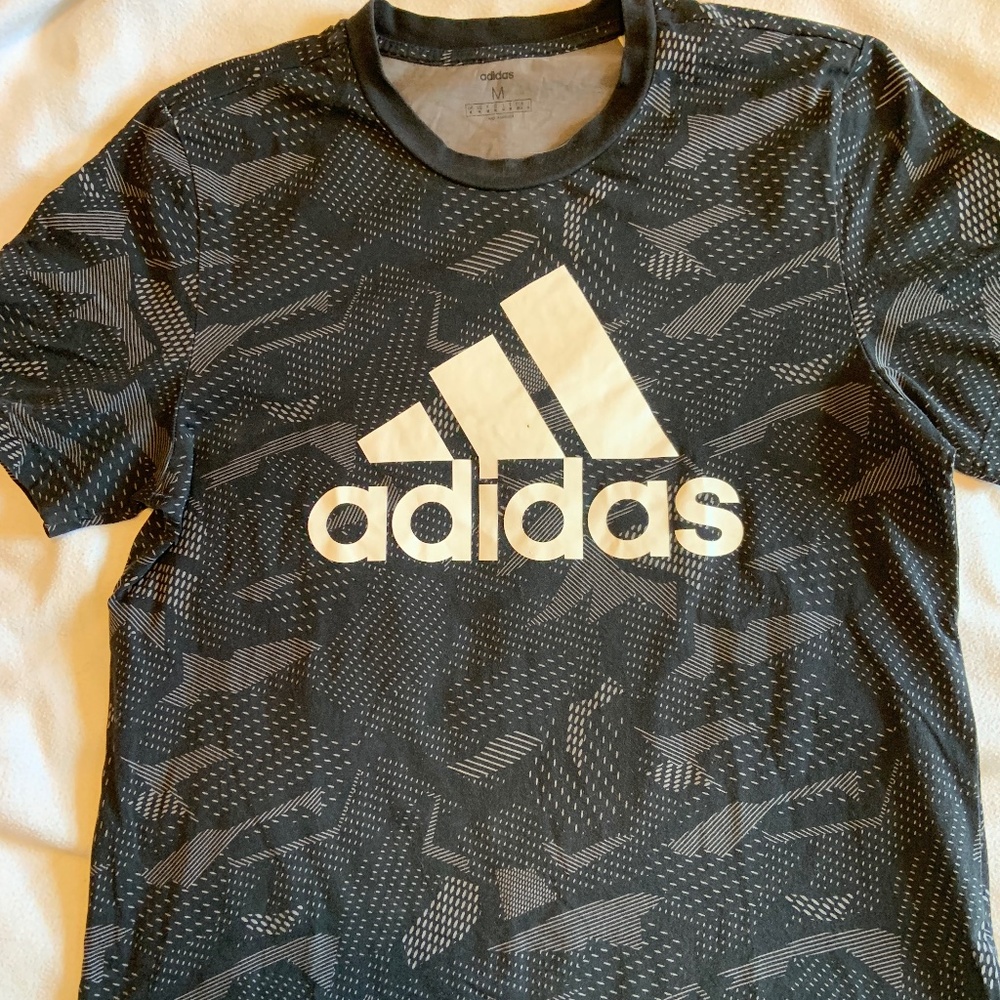 Black Adidas shirt with white logo